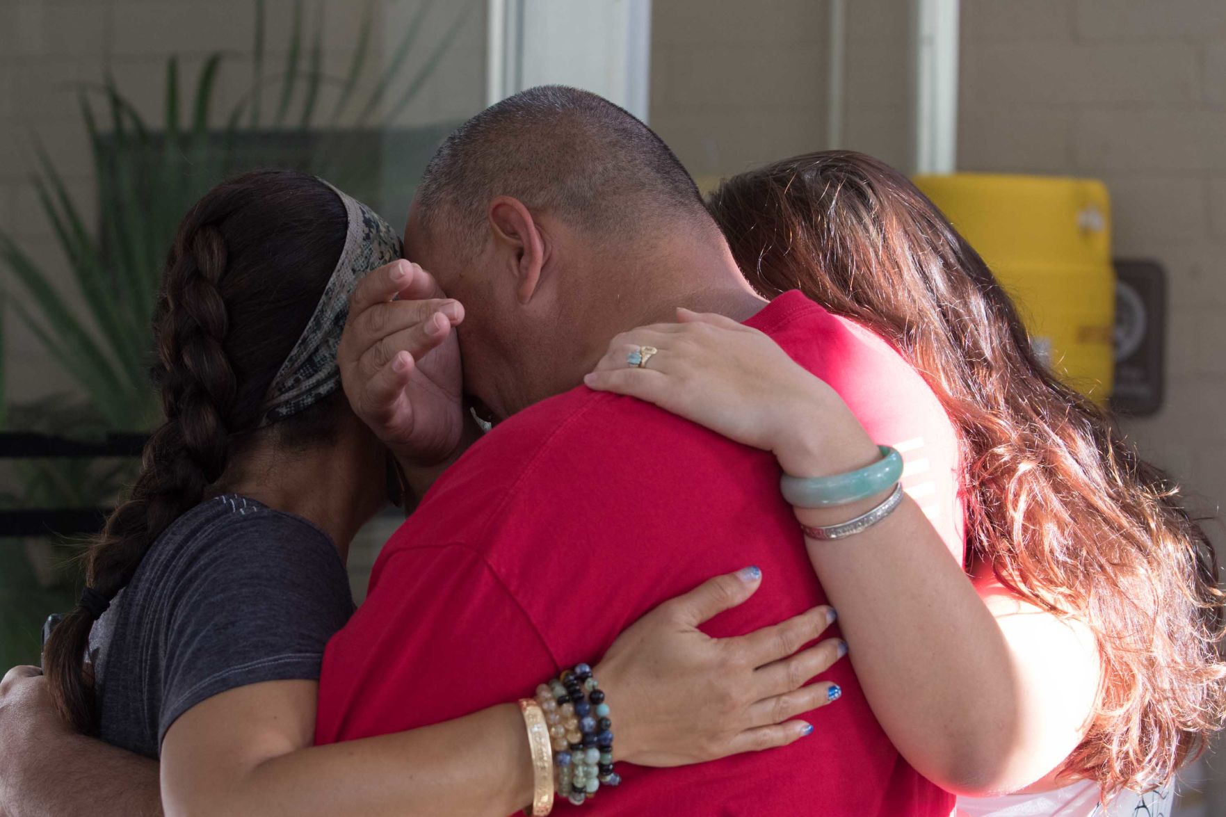 Emotional moment between Maunakea kia'i (protectors)